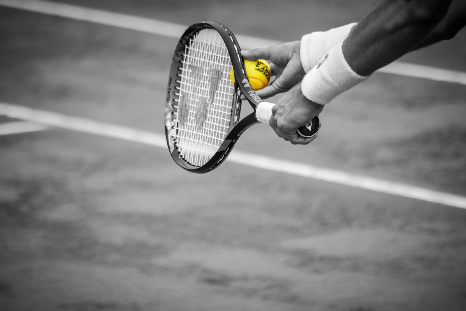 Ready to serve. Tennis coach preparing to serve